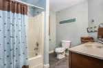 Main level full bathroom with shower tub combo